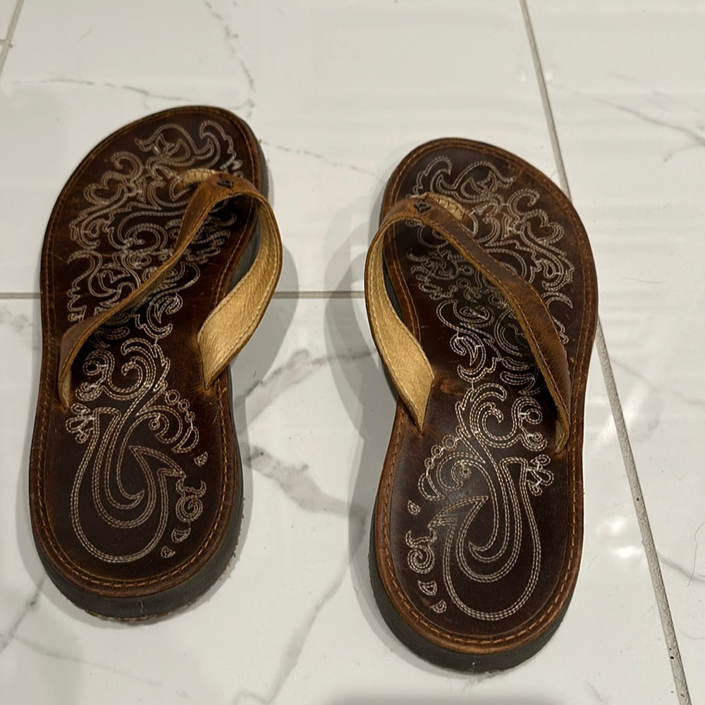 Brown leather Olukai Flip Flops